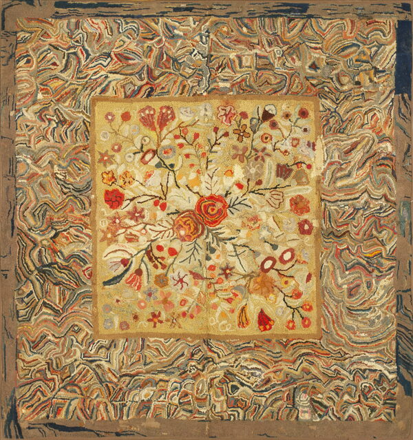 Hooked rug with a yellow center displaying red florals, bordered by wide, multicolored abstract swirling patterns.