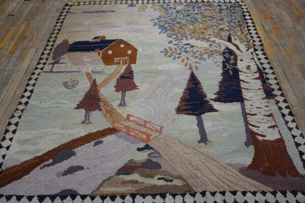 High-pile rug featuring a pictorial landscape of a house and trees, lying on rustic wood planks.