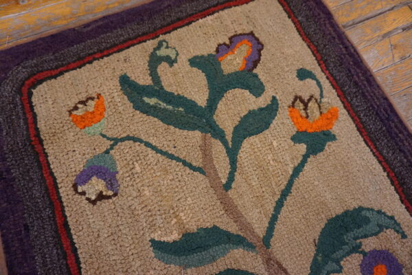 Colorful floral design on textured rug