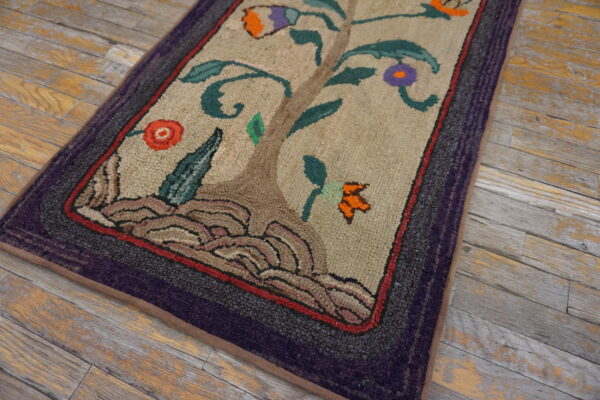 Colorful floral design on ivory rug
