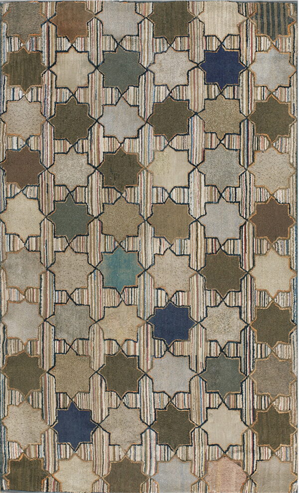 Geometric rug with octagonal motifs in earth tones and blue, connected by vertical multicolored striped bands.