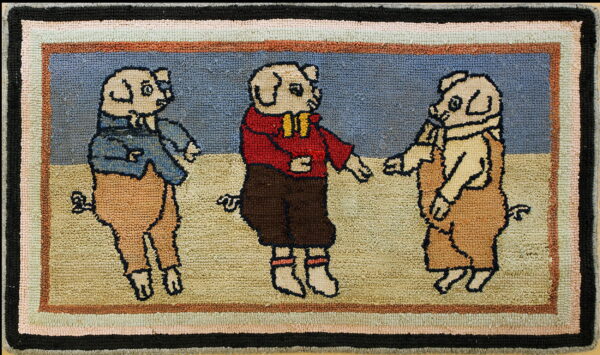 Hooked rug depicting three anthropomorphic pigs wearing clothing against blue and tan fields, with a multi-colored striped border.