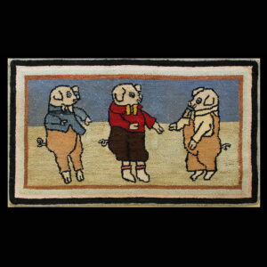 Hooked rug displaying three cartoon pigs standing in human clothes within a colorful multi-stripe border.