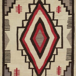 Off-white geometric rug with a red, brown, and gray central diamond surrounded by stepped patterns.