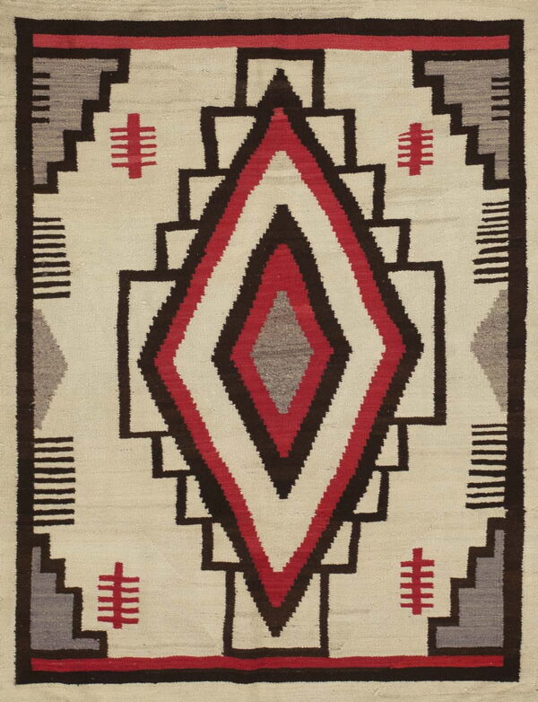 Off-white geometric rug with a red, brown, and gray central diamond surrounded by stepped patterns.