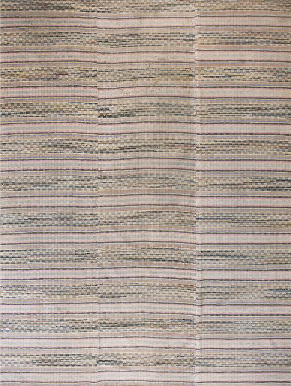 Neutral flatweave rug with wide stripes and small checkered bands, accented by thin pink and blue lines.