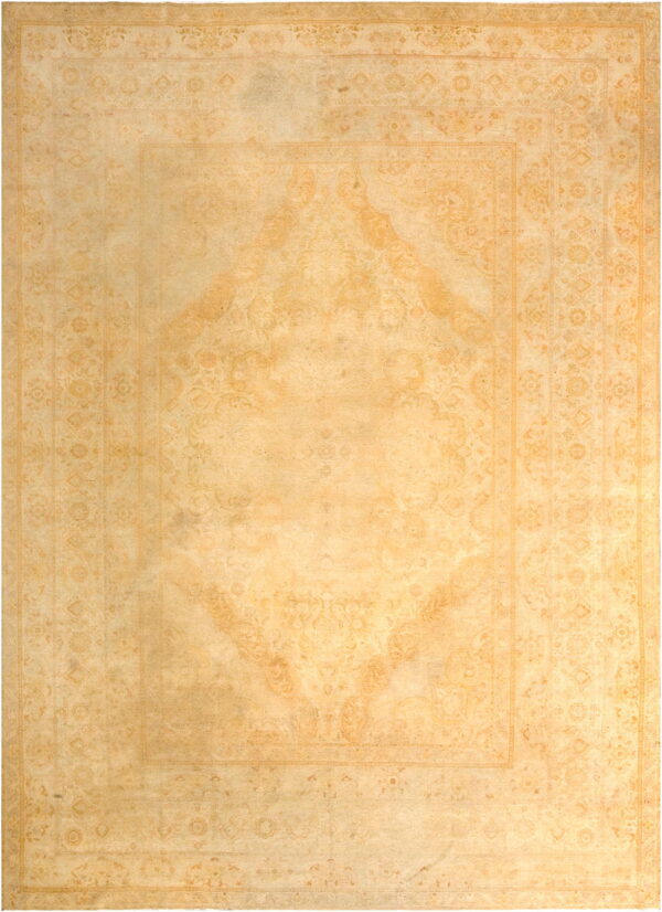 Monochromatic traditional rug featuring a faded medallion and borders in subtle cream and tan.