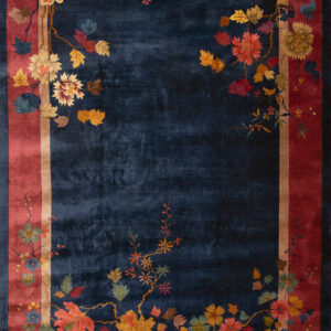 Floral design on navy background rug