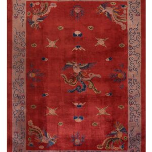 Crimson rug with stylized phoenix and cloud patterns, framed by a light rose scrolling border.