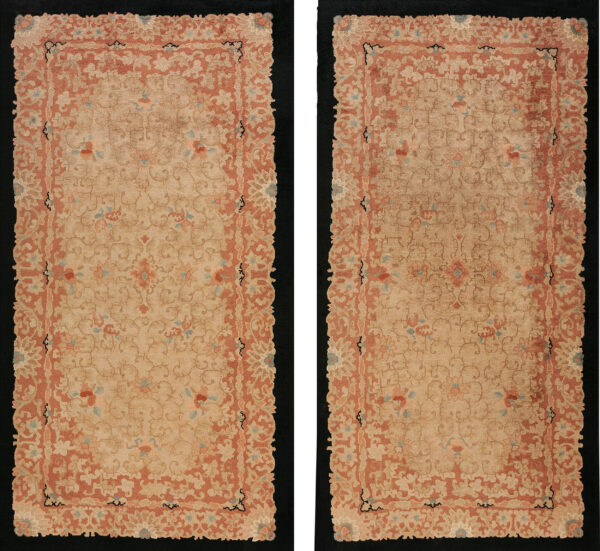 A low-pile rectangular rug displaying dense, traditional floral patterns in beige, rust, and pale blue.