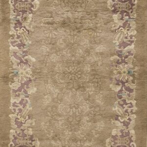 Medium-pile taupe rug with an embossed floral pattern border in purple, cream, and pale blue.
