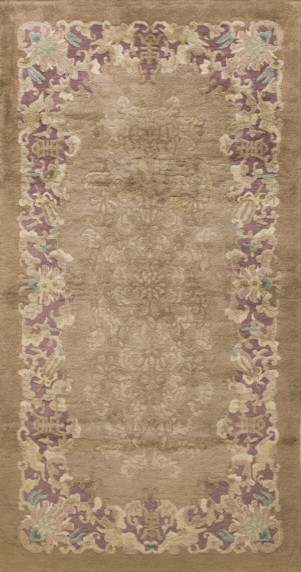 Medium-pile taupe rug with an embossed floral pattern border in purple, cream, and pale blue.