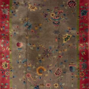 High-pile rug with a taupe field and rose border, featuring an elaborate floral and lantern pattern.