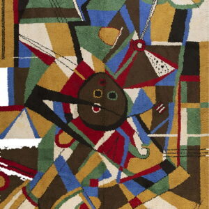 Colorful abstract rug with a dense pile, showing angular blocks of blue, red, gold, green, and brown.