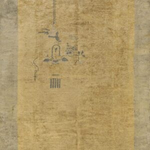 Distressed tan and gray rug featuring a sparse, charcoal linear pattern in the faded center field.