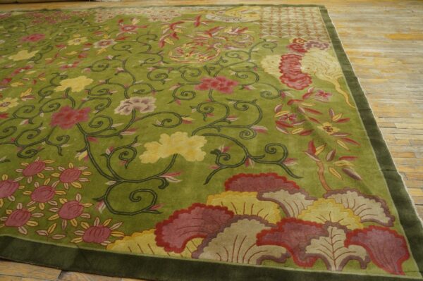 Chartreuse high-pile rug featuring carved floral patterns in red, pink, and yellow rests on worn wood flooring.