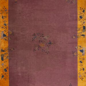Mauve field rug with a wide yellow-orange border decorated with stylized vases and floral branches.
