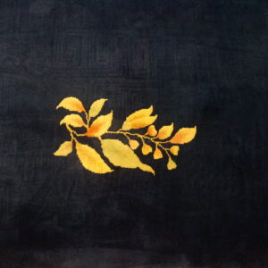 Navy rug with yellow floral design