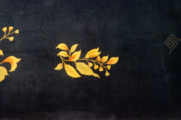 Navy rug with yellow floral design