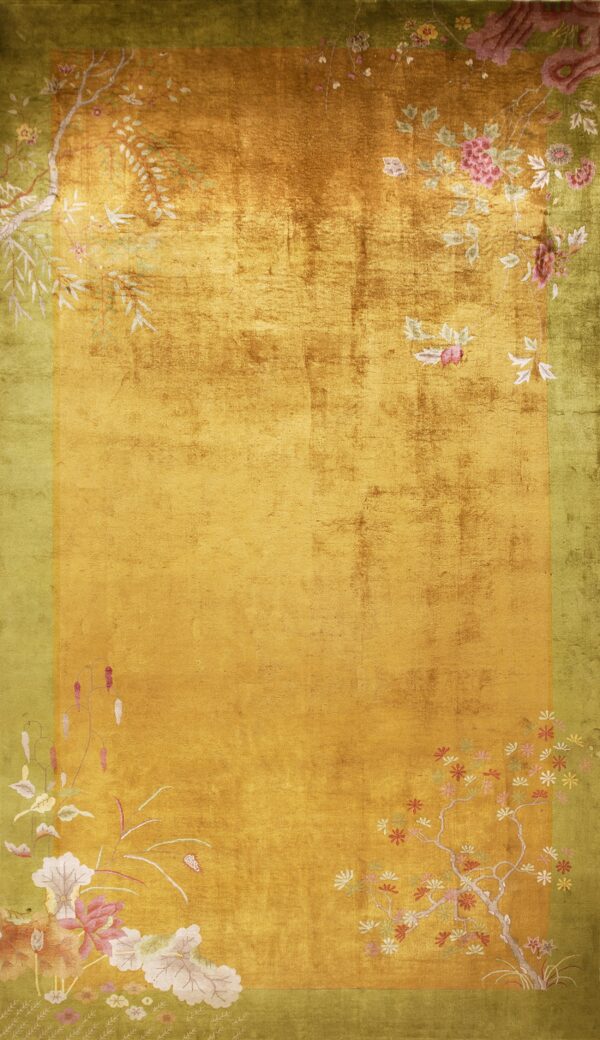 Textured, shimmering gold rug with an olive border and asymmetric pink and white floral designs.