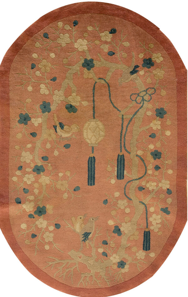 Floral design on salmon background rug.