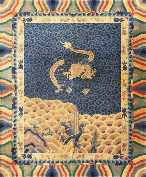 Blue and gold rug with a dragon and clouds pattern, framed by a multi-color rainbow striped border.