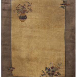 Gold rug with a wide brown border and colorful stylized vases and baskets near the corners.