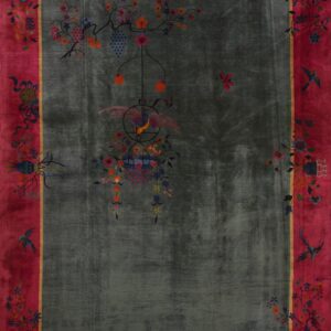 Deep rose border frames a plush sage field featuring colorful hanging floral and bird designs.