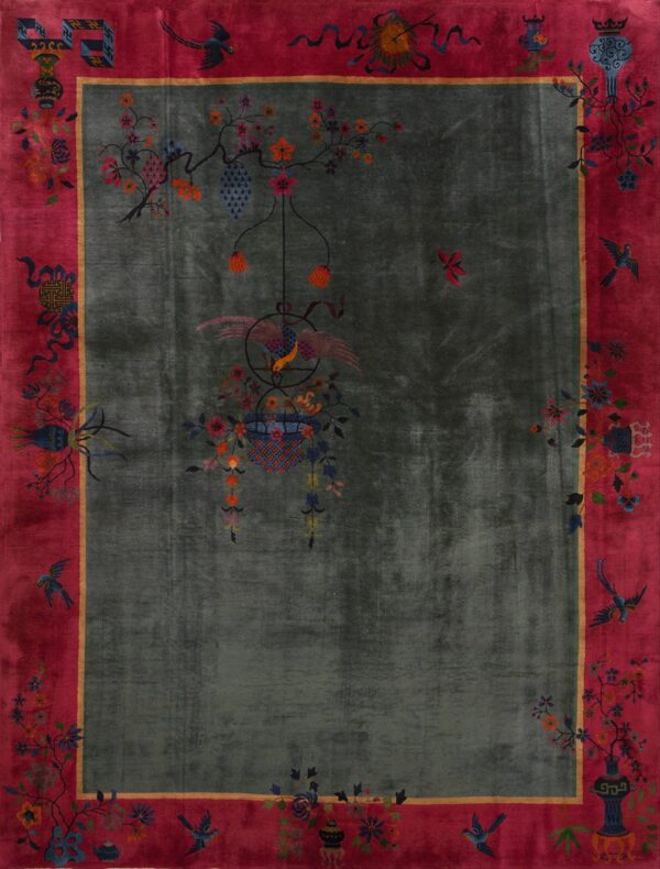 Deep rose border frames a plush sage field featuring colorful hanging floral and bird designs.