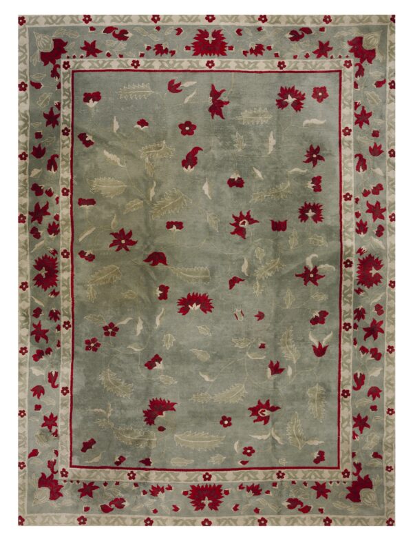 Dusty teal rug with a red and pale green all-over floral pattern and banded outer border.