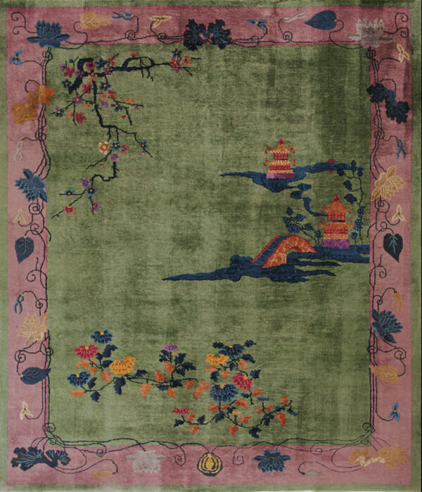 Sage green rug with a colorful floral and pagoda landscape design inside a pink botanical border.
