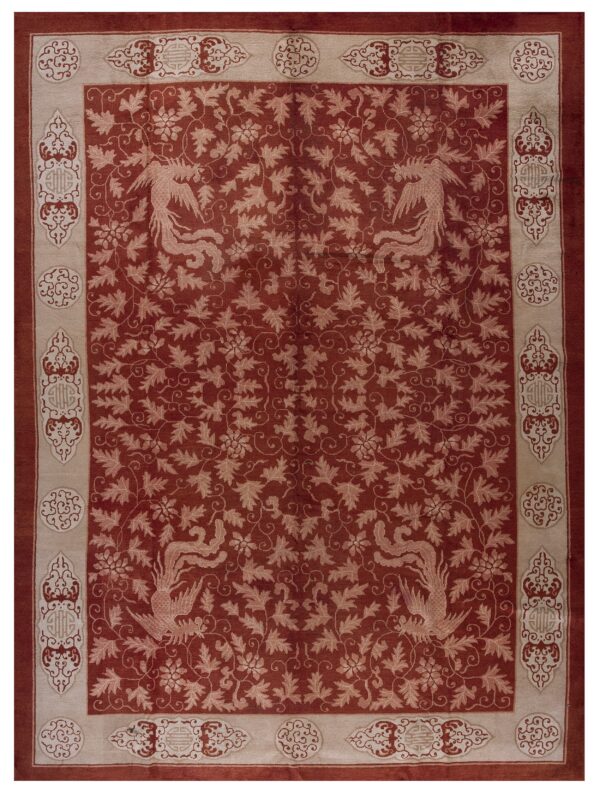 Terracotta rug with a dense beige foliate pattern, four stylized birds, and an elaborate decorative border.