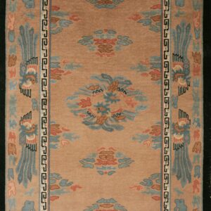 Beige rug with floral art deco design.