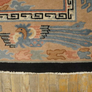 Colorful art deco rug with motifs.