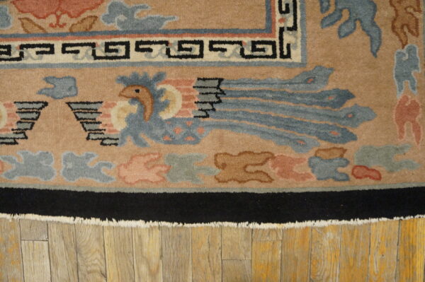 Colorful art deco rug with motifs.