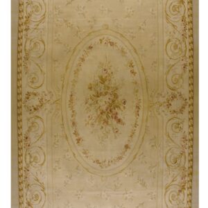 Pale beige rug featuring intricate floral bouquets and gold scrolling borders surrounding a central medallion.