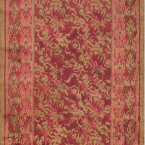 High-pile runner rug with tan floral motifs on maroon, featuring a detailed patterned pink and tan border.