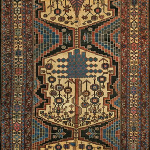 Traditional runner rug showing three nested geometric panels on a golden field bordered by complex repeating designs.