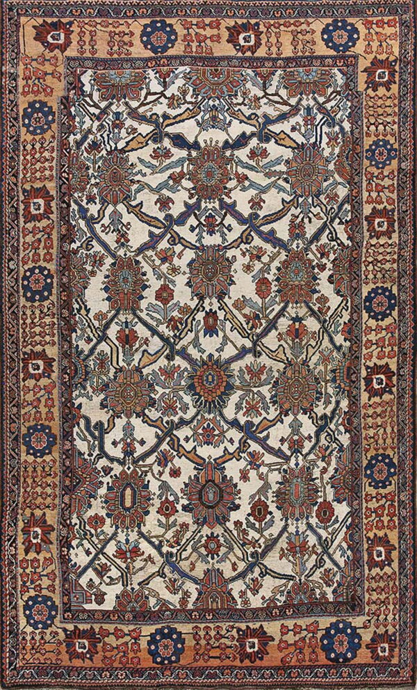 Ivory rug with complex blue and rust floral medallions and a wide, geometric tan border.