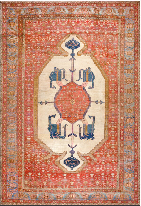 Red rug with an ivory center featuring stylized blue motifs, an angular medallion, and blue-toned guard borders.