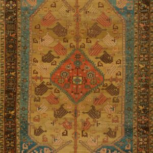 Low-pile rug with a gold field, red center medallion, stylized geometric bird figures, and a turquoise border.