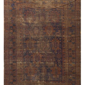 Dark brown, rust, and dark blue geometric rug with heavy distress, frayed edges, and low pile.