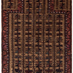Dark brown and tan geometric rug with repeating patterns and red accent borders.