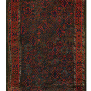 Dark geometric rug with red and navy interlocking diamond patterns, featuring a wide red border and flat-woven ends.