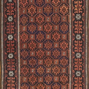 Rust red and navy blue geometric motifs fill the field of this dark brown bordered rug.