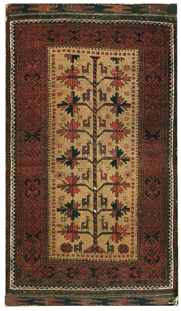 Tan rug with a central tree of life design surrounded by a wide geometric red and dark border.