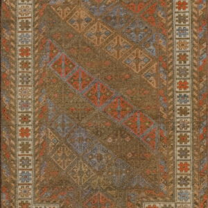 Geometric brown rug with low pile texture, diagonal diamond patterns, and stepped borders in rust and blue.