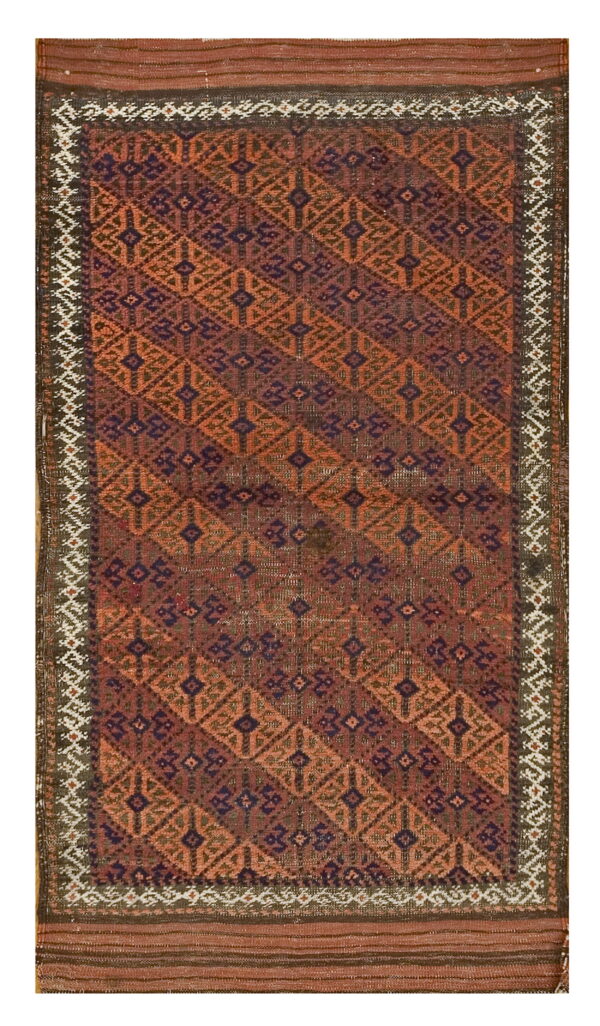 Geometric rug displaying repeating diamond motifs in rust, terracotta, and deep purple with serrated white patterned borders.