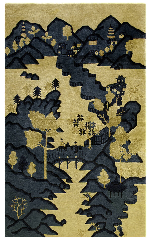 High-contrast rug in gold and deep teal depicting a pictorial landscape with layered mountains and figures.