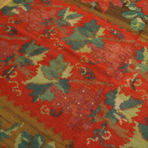 Colorful floral pattern on textured rug